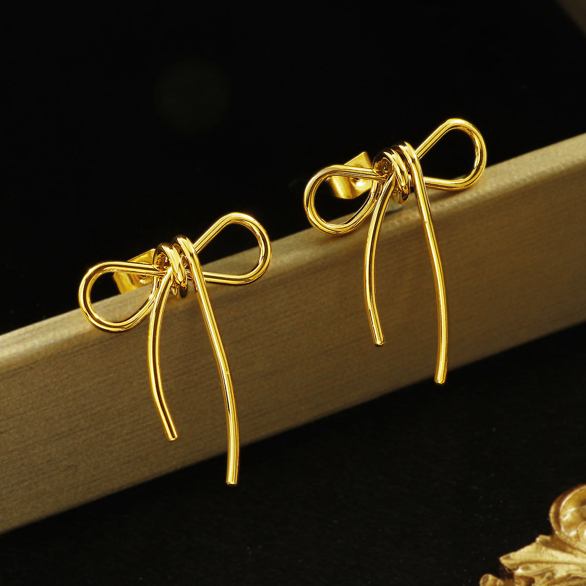 Thin Bow Dangle Stud
