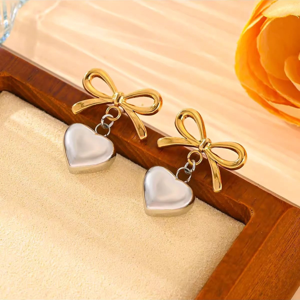 Bow and Heart Dangle Stud